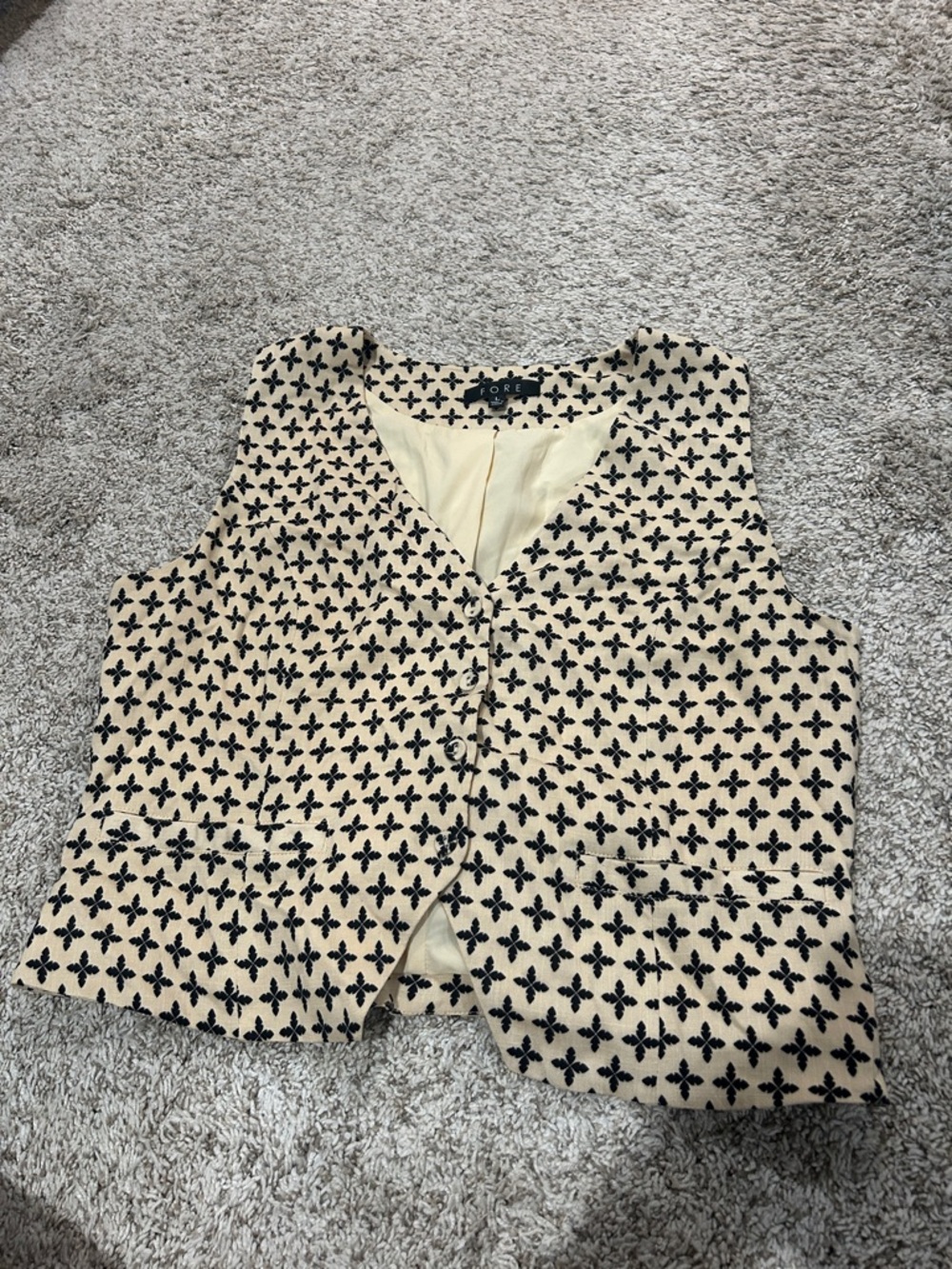 FORE Textured Cream Button Down Vest with Black Fleur Pattern and Tie Back